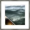 Paddling Before The Storm Framed Print