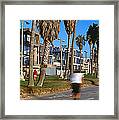 People Riding Bicycles Near A Beach Framed Print