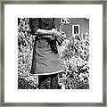 Person Wearing A Gardening Apron Framed Print