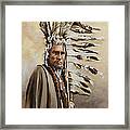 Piegan Warrior With Coup Stick Framed Print
