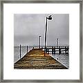 Pier Into The Fog Framed Print