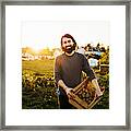Portrait Of Urban Farmer Holding Crate Of Potatoes Framed Print