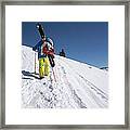 Pro Skier Hiking Up The Mountain Framed Print