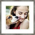 Puppy Kissing Teenage Girl Framed Print