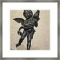 Putto With Dolphin By Verrocchio Framed Print