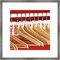 Rail Of Clothes Hangers With Sale Tags Attached, Close-up Framed Print
