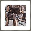 Reading A Book Framed Print