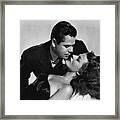 Rita Hayworth About To Be Kissed Framed Print