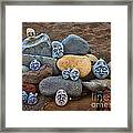 Rocky Faces In The Sand Framed Print