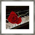Rose And Piano Framed Print