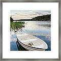 Rowboat And Lake View Framed Print
