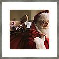 Santa Claus Carrying Sack Of Gifts, Portrait, Close-up Framed Print