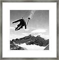 Skiing Over Mt. Ranier Framed Print