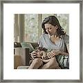 Sleeping Boy Laying In Lap Of Mother Framed Print