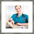 Smiling Nurse Holding Canadian Money Framed Print
