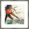 Smiling Young Female Kiteboarder On The Sea Framed Print