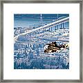 Snowboarding Over The City Framed Print