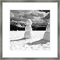 Snowmen On Johnson Lake Framed Print