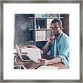 So Nerd And Focused. Young Handsome Afro Student Is Concentrated On Studying. He Is In A Casual Outfit With Project At His Work Station Framed Print