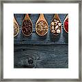 Spices On Spoons In Wooden Background Framed Print