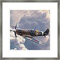 Spitfire Plane Flying In Storm Cloud Framed Print