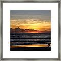 Strolling The Beach During Sunset Framed Print