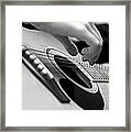 Strum Framed Print