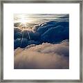 Sunburst Above The Clouds Framed Print