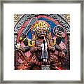 A Nepali School Girl Offers A Butter Lamp To The Fearsome Kala Bhairava Framed Print