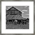 Tobacco Barns With Clouds Framed Print