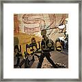 Torn Cloth Banner And Street Scene Framed Print