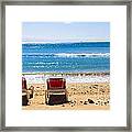 Two Empty Sun Loungers On Beach By Sea Framed Print