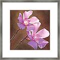 Two Heads In The Pink Framed Print