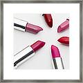 Various Lipsticks On White Background Framed Print