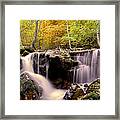 Waterfall In The Mountain Framed Print