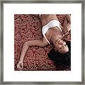 Woman Lying On Bed Framed Print