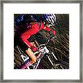 Woman Mountain Biking Framed Print