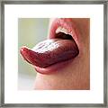 Woman Sticking Out Tongue Framed Print