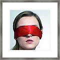 Woman Wearing Red Blindfold Framed Print
