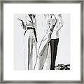 Women And A Man In Suits Framed Print
