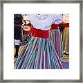 Women Dancing In Traditional Clothing For A Celebration Framed Print