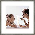 Women With A Mirror Framed Print
