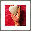 Wooden Hand With White Heart Framed Print