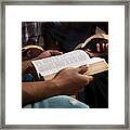 Young Adults In A Bible Study. Framed Print
