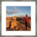 Young Man Hiking On Slickrock Framed Print