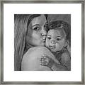 Young Mother With Her Baby Framed Print