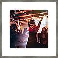 Young Woman In Scary Clown Costume Dancing At Halloween Party Framed Print