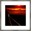 Scenic View Of An Approaching Trrain Near Sunset #1 Framed Print