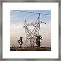 A Transmission Tower Carrying Electric Lines In The Countryside Framed Print