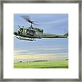 A Uh-1n Huey Helicopter Prepares Framed Print